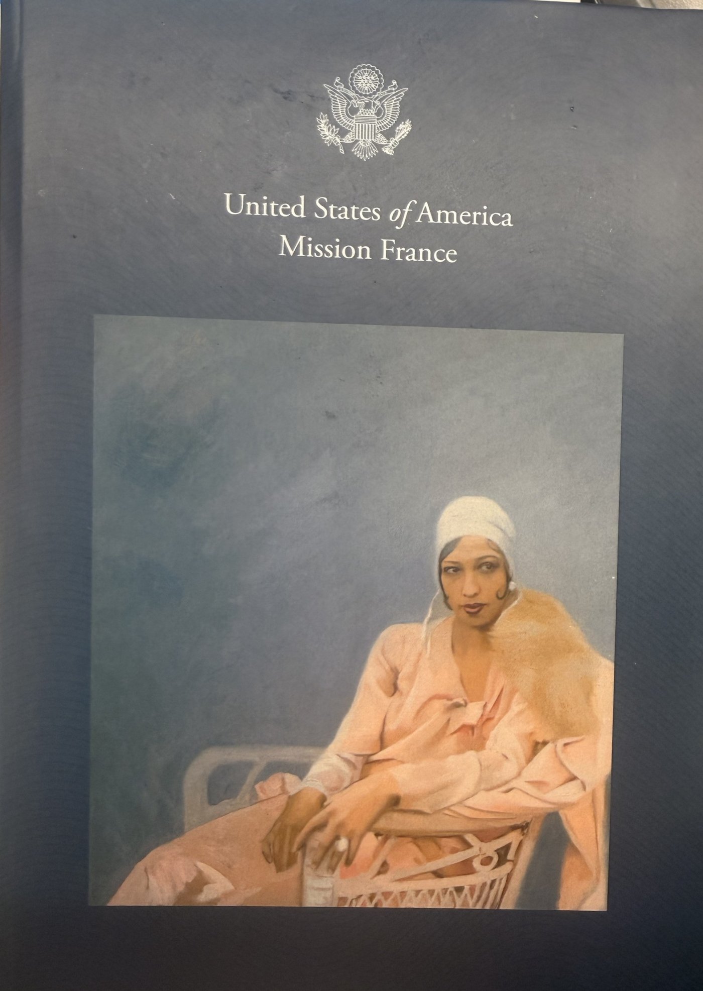 Cover of the United States Mission France souvenir journal for the Josephine Baker portrait dedication