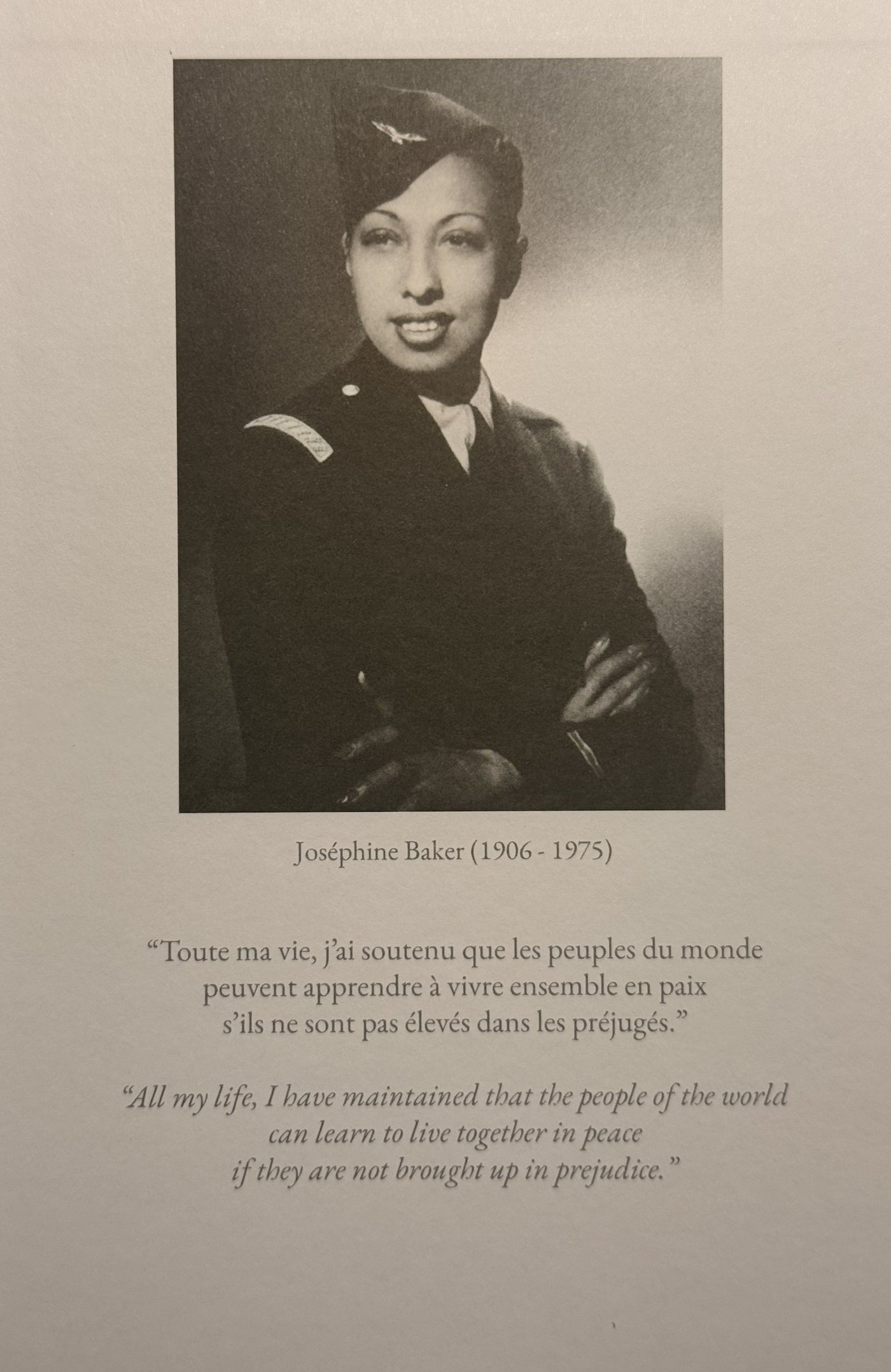 Journal page with a wartime photograph of Josephine Baker in uniform above her words on peace and prejudice